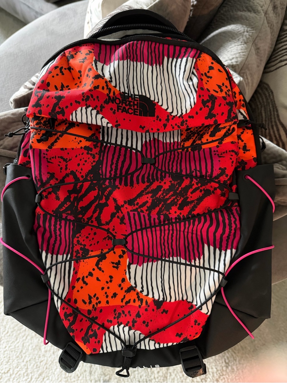 The North Face Red, Orange & Pink Graphic backpack